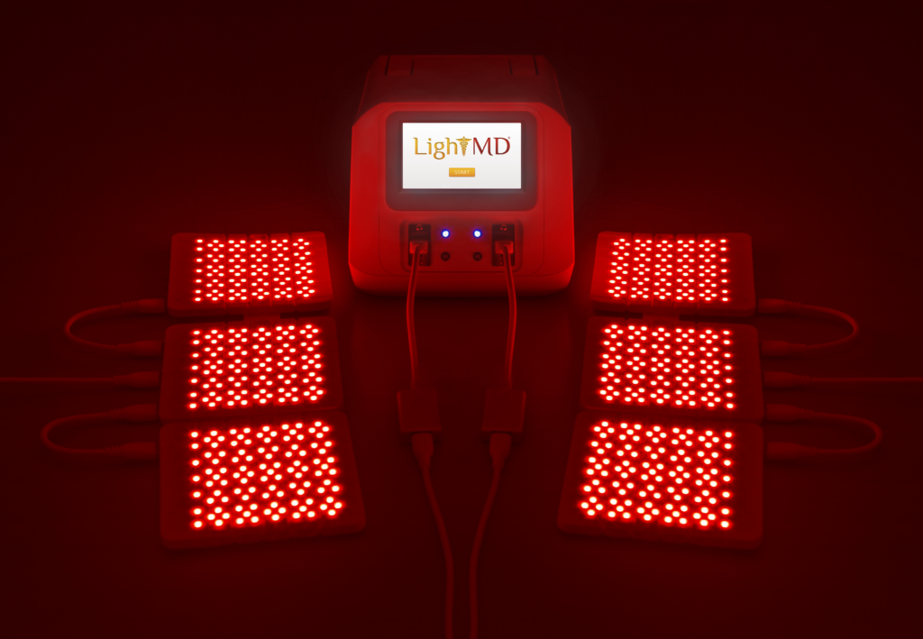 Full setup of our PBT system, complete with six LED pads glowing with red light.